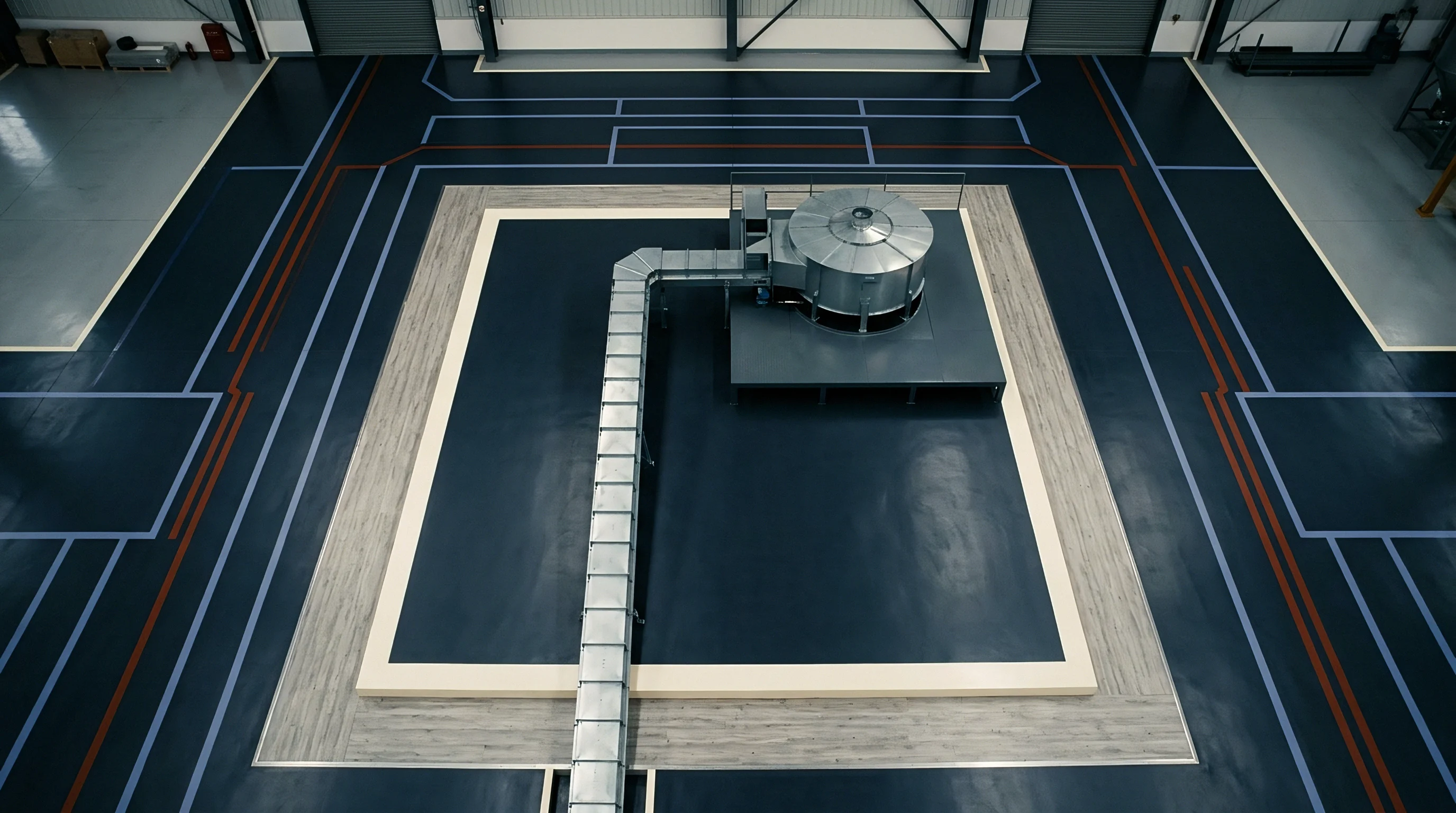 Overhead perspective reveals industrial floor markings organizing a manufacturing facility housing centralized ventilation machinery connected by metallic ducting.